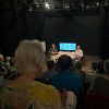 Charles Cordell on stage at the Tabard Theatre during the Chiswick Book Festival, in discussion with historian Julian Humphrys.