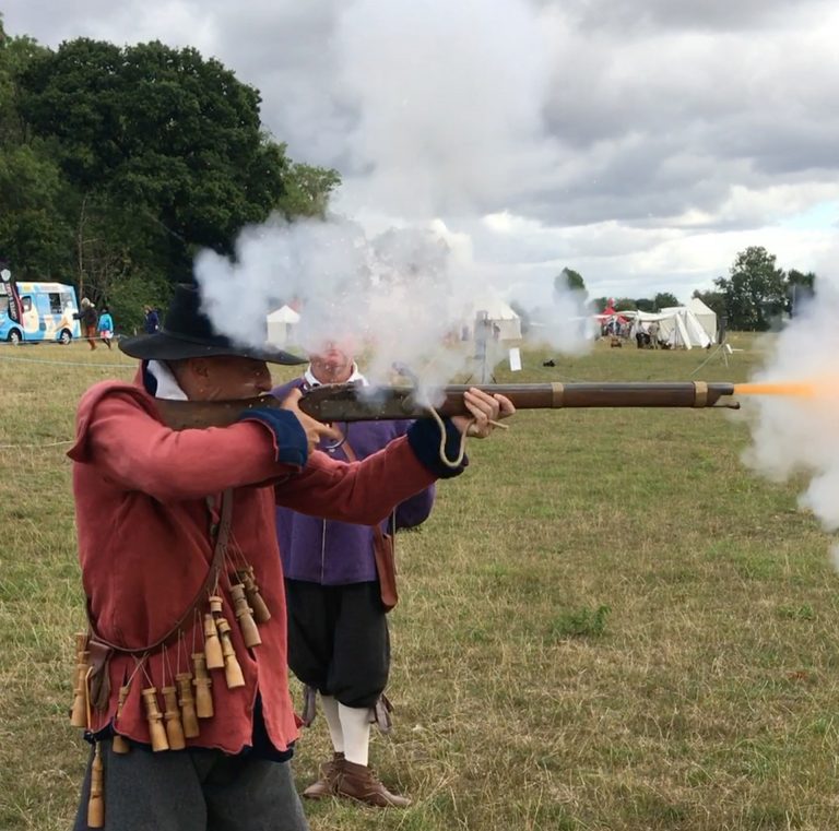 Charles Cordell - author of English Civil War historical fiction series Divided Kingdom - firing a well charged Civil War matchlock musket.